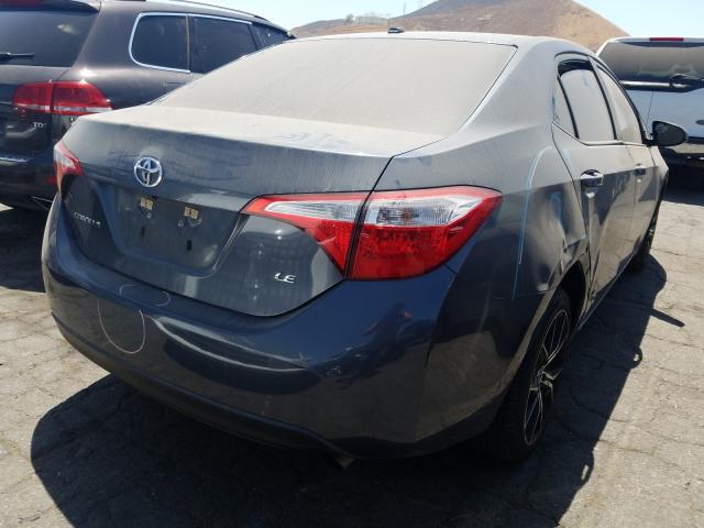 Photo 3 VIN: 5YFBURHE7GP477929 - TOYOTA COROLLA L 