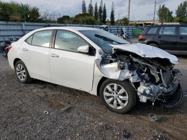 Photo 3 VIN: 5YFBURHE7GP495539 - TOYOTA COROLLA L 