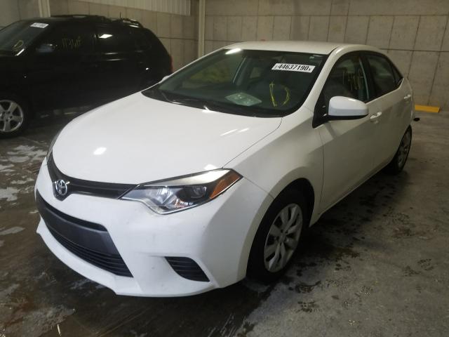 Photo 1 VIN: 5YFBURHE7GP507575 - TOYOTA COROLLA L 