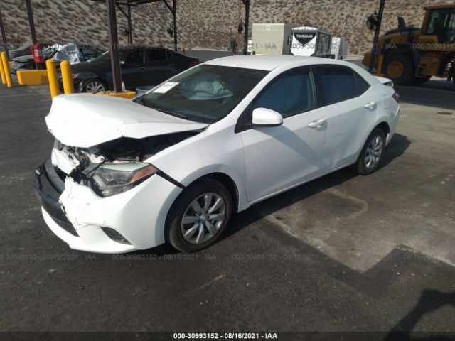 Photo 1 VIN: 5YFBURHE7GP520259 - TOYOTA COROLLA 