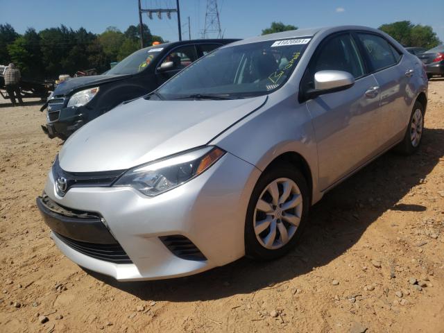 Photo 1 VIN: 5YFBURHE7GP562348 - TOYOTA COROLLA L 