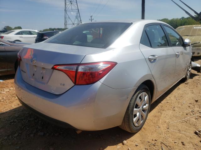 Photo 3 VIN: 5YFBURHE7GP562348 - TOYOTA COROLLA L 