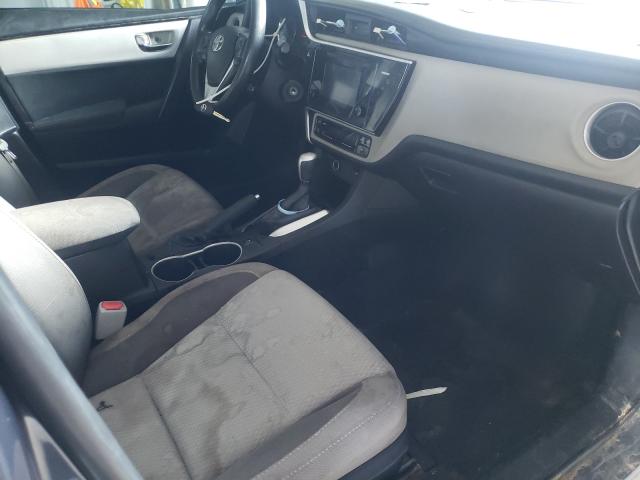 Photo 4 VIN: 5YFBURHE7HP592936 - TOYOTA COROLLA L 