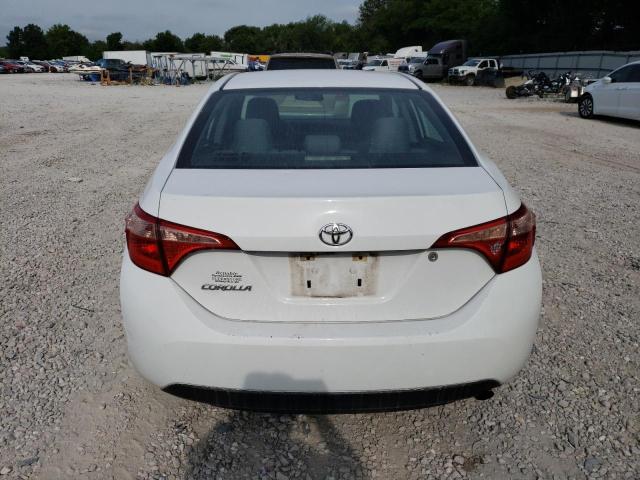 Photo 5 VIN: 5YFBURHE7HP597490 - TOYOTA COROLLA L 