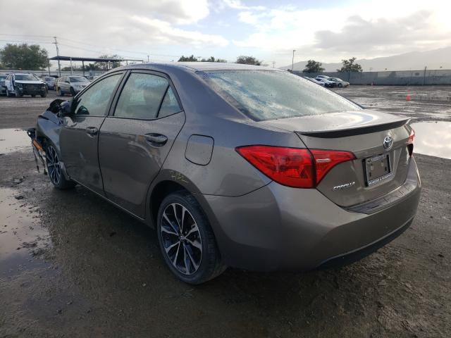 Photo 2 VIN: 5YFBURHE7HP608438 - TOYOTA COROLLA L 