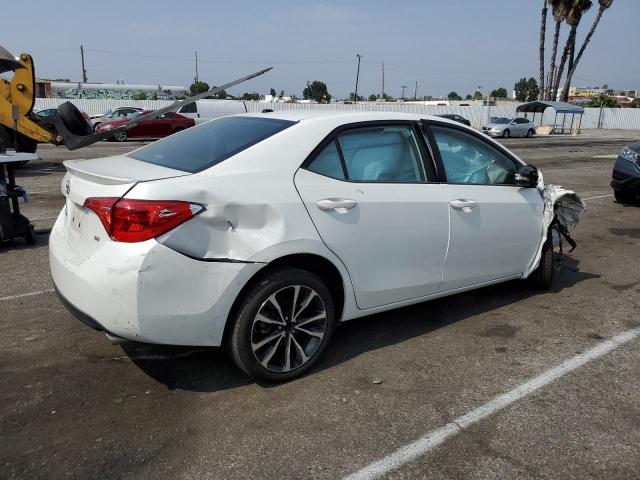 Photo 2 VIN: 5YFBURHE7HP639799 - TOYOTA COROLLA L 