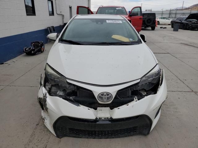 Photo 4 VIN: 5YFBURHE7HP646011 - TOYOTA COROLLA L 