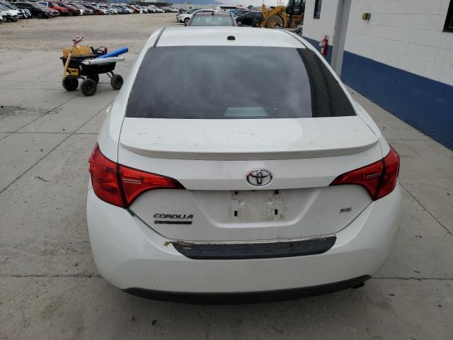 Photo 5 VIN: 5YFBURHE7HP646011 - TOYOTA COROLLA L 