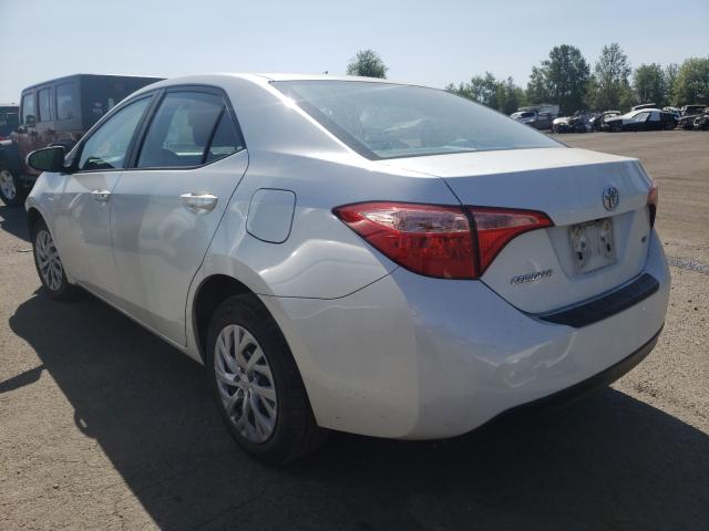 Photo 2 VIN: 5YFBURHE7HP648406 - TOYOTA COROLLA L 