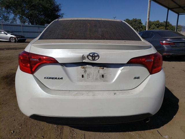 Photo 5 VIN: 5YFBURHE7HP651502 - TOYOTA COROLLA L 