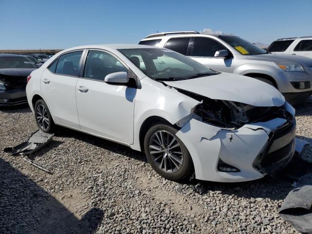 Photo 3 VIN: 5YFBURHE7HP659017 - TOYOTA COROLLA L 