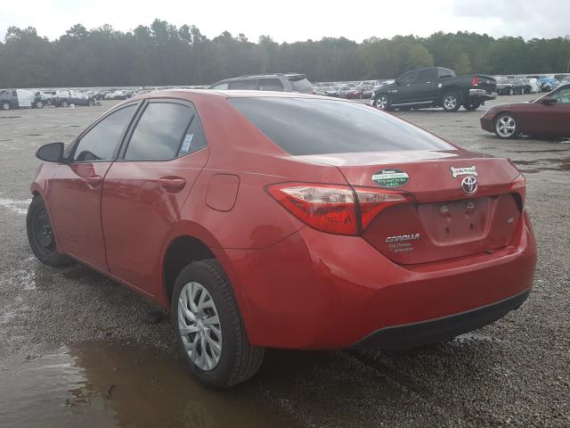 Photo 2 VIN: 5YFBURHE7HP669725 - TOYOTA COROLLA L 