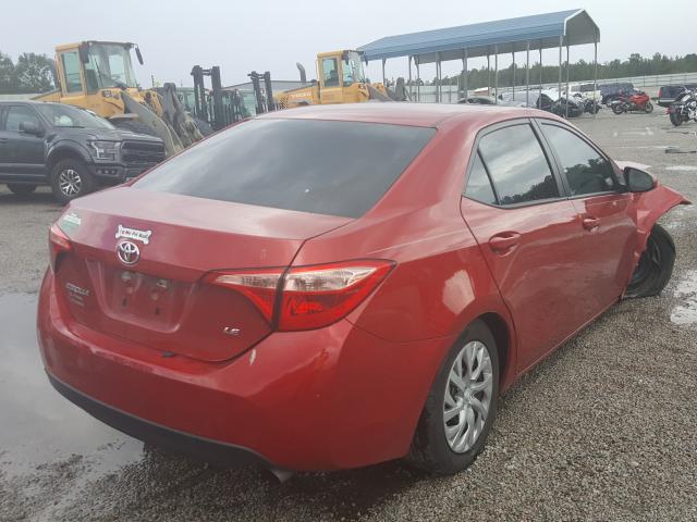 Photo 3 VIN: 5YFBURHE7HP669725 - TOYOTA COROLLA L 