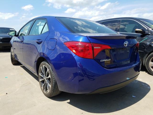 Photo 2 VIN: 5YFBURHE7HP671670 - TOYOTA COROLLA L 