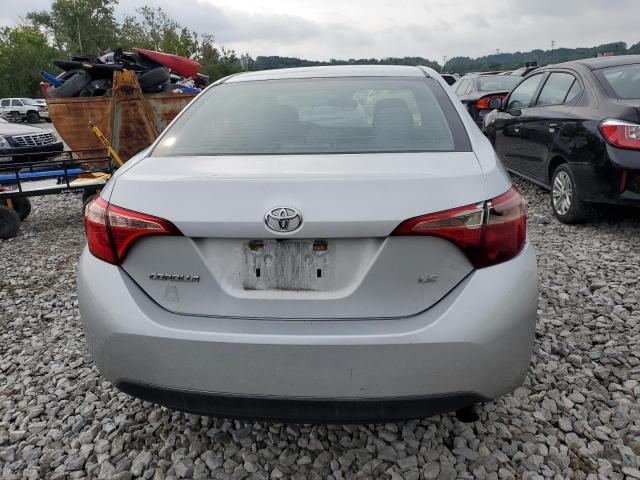 Photo 5 VIN: 5YFBURHE7HP675458 - TOYOTA COROLLA L 