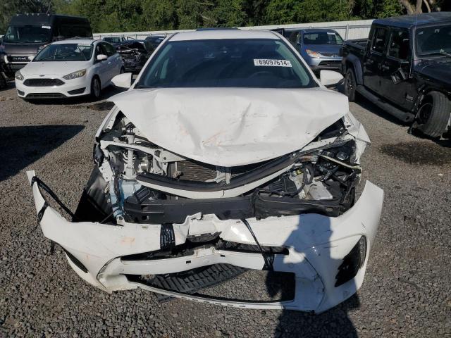 Photo 4 VIN: 5YFBURHE7HP694544 - TOYOTA COROLLA L 