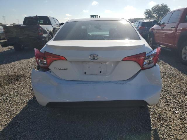 Photo 5 VIN: 5YFBURHE7HP694544 - TOYOTA COROLLA L 