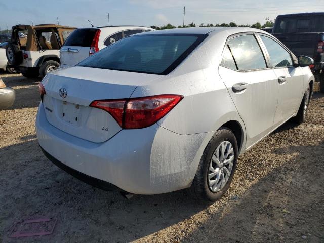 Photo 3 VIN: 5YFBURHE7HP696052 - TOYOTA COROLLA L 