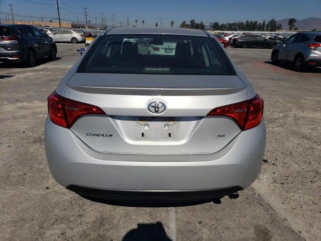 Photo 5 VIN: 5YFBURHE7HP700472 - TOYOTA COROLLA L 