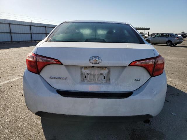 Photo 5 VIN: 5YFBURHE7HP712010 - TOYOTA COROLLA L 