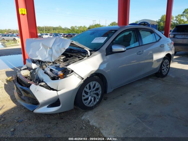 Photo 1 VIN: 5YFBURHE7JP739973 - TOYOTA COROLLA 