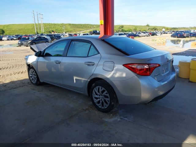 Photo 2 VIN: 5YFBURHE7JP739973 - TOYOTA COROLLA 