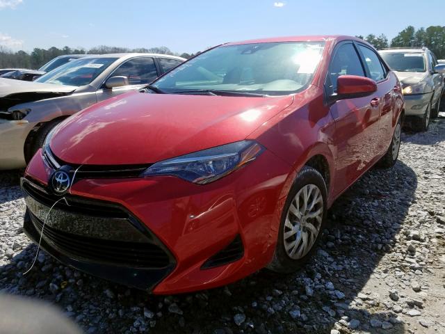 Photo 1 VIN: 5YFBURHE7JP748270 - TOYOTA COROLLA L 