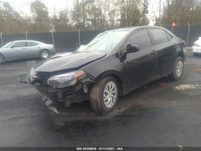 Photo 1 VIN: 5YFBURHE7JP750875 - TOYOTA COROLLA 