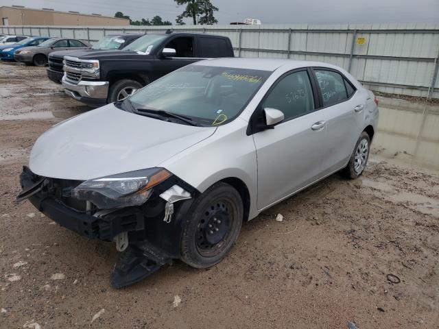 Photo 1 VIN: 5YFBURHE7JP753579 - TOYOTA COROLLA L 