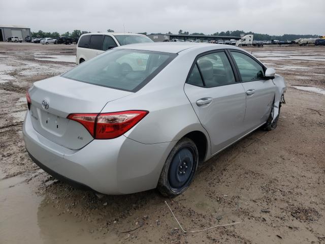 Photo 3 VIN: 5YFBURHE7JP753579 - TOYOTA COROLLA L 