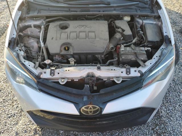 Photo 10 VIN: 5YFBURHE7JP756076 - TOYOTA COROLLA L 