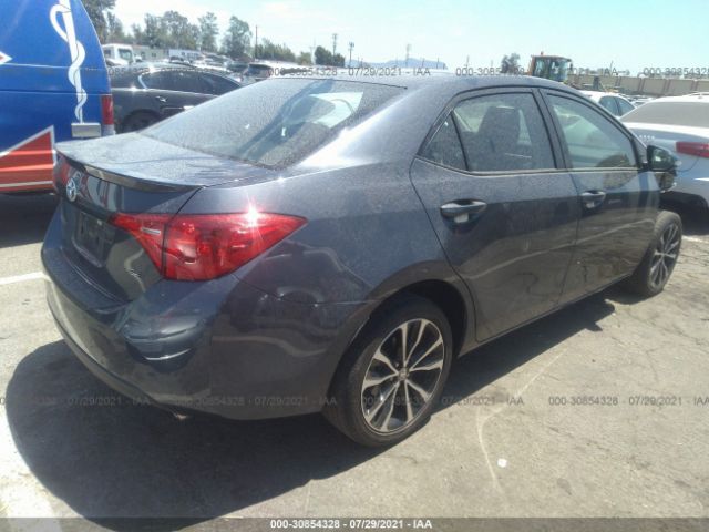 Photo 3 VIN: 5YFBURHE7JP762184 - TOYOTA COROLLA 