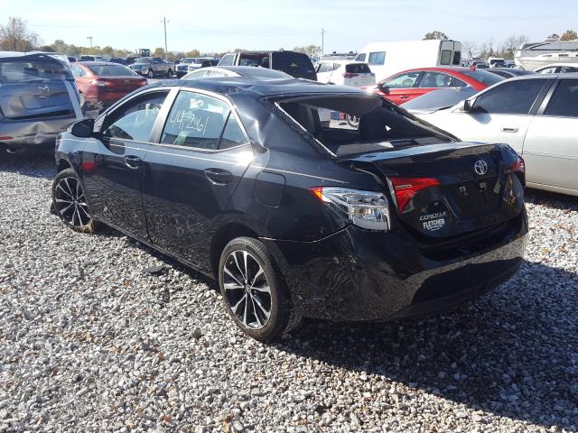 Photo 2 VIN: 5YFBURHE7JP766512 - TOYOTA COROLLA L 