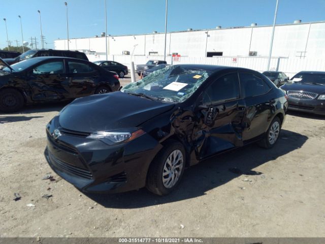 Photo 1 VIN: 5YFBURHE7JP772004 - TOYOTA COROLLA 