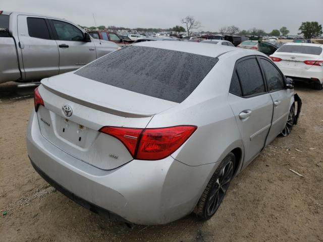 Photo 3 VIN: 5YFBURHE7JP775713 - TOYOTA COROLLA L 