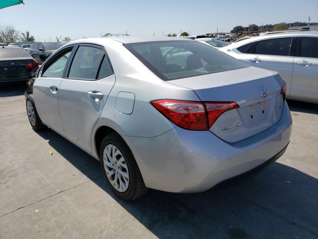 Photo 2 VIN: 5YFBURHE7JP779809 - TOYOTA COROLLA L 