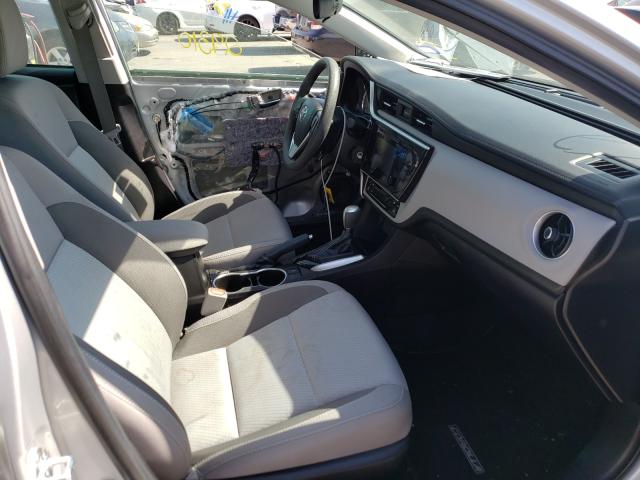 Photo 4 VIN: 5YFBURHE7JP779809 - TOYOTA COROLLA L 