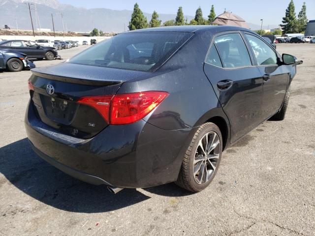 Photo 3 VIN: 5YFBURHE7JP785450 - TOYOTA COROLLA L 