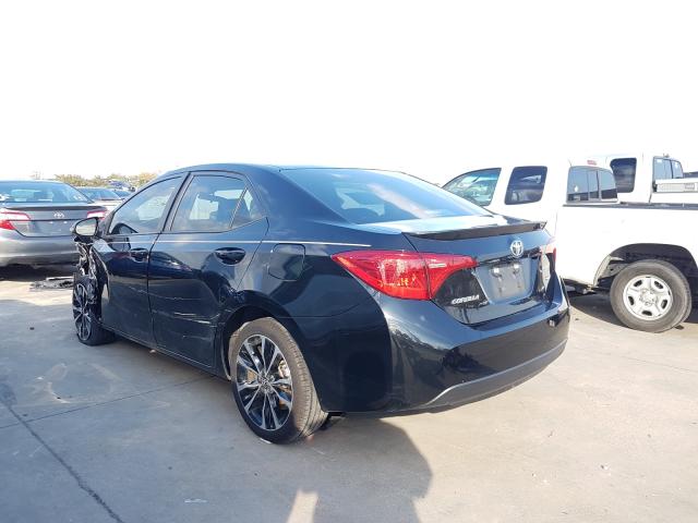 Photo 2 VIN: 5YFBURHE7JP789014 - TOYOTA COROLLA L 