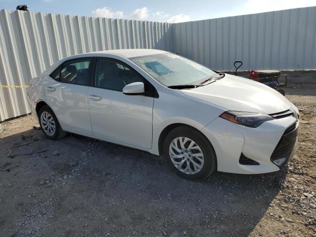 Photo 3 VIN: 5YFBURHE7JP792639 - TOYOTA COROLLA L 