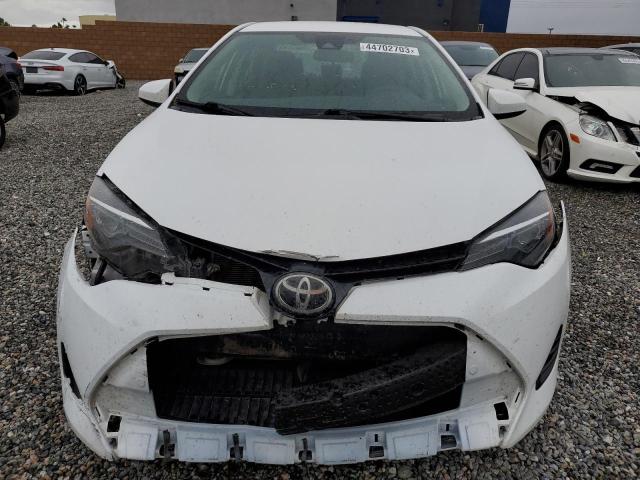 Photo 4 VIN: 5YFBURHE7JP793161 - TOYOTA COROLLA L 