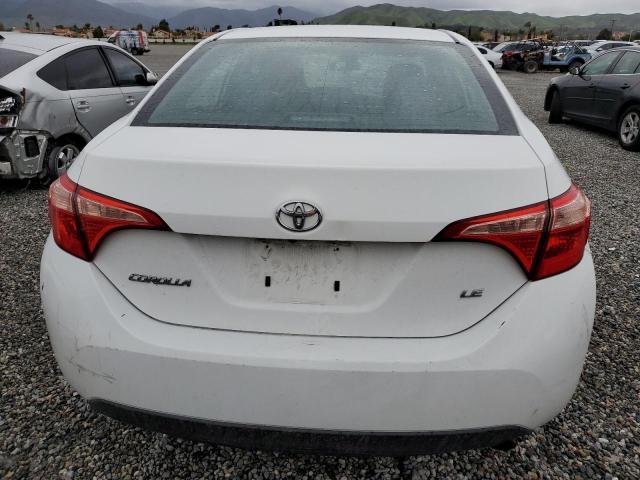 Photo 5 VIN: 5YFBURHE7JP793161 - TOYOTA COROLLA L 