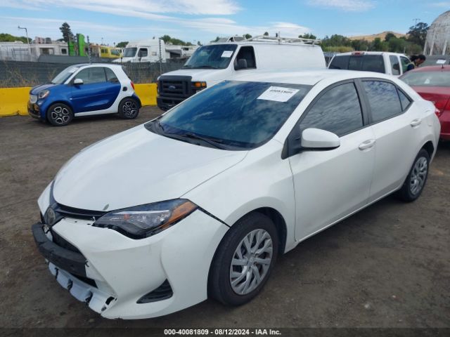 Photo 1 VIN: 5YFBURHE7JP795007 - TOYOTA COROLLA 