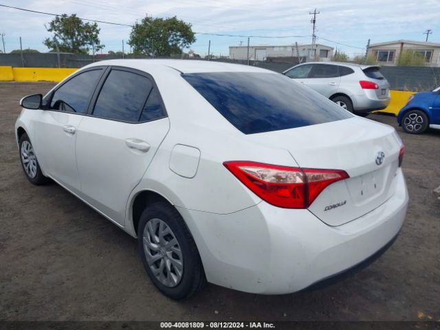 Photo 2 VIN: 5YFBURHE7JP795007 - TOYOTA COROLLA 