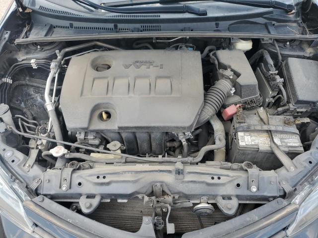 Photo 10 VIN: 5YFBURHE7JP796920 - TOYOTA COROLLA L 