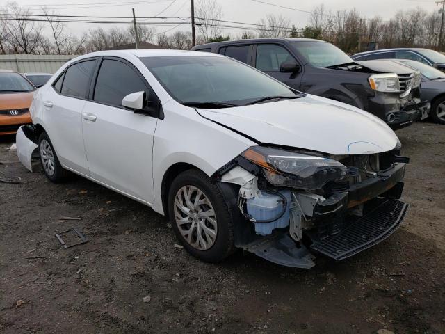 Photo 3 VIN: 5YFBURHE7JP802778 - TOYOTA COROLLA L 