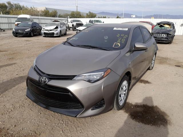 Photo 1 VIN: 5YFBURHE7JP803719 - TOYOTA COROLLA L 