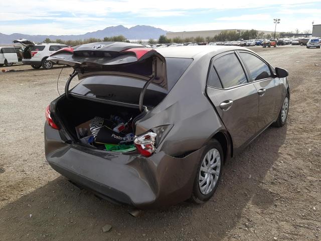 Photo 3 VIN: 5YFBURHE7JP803719 - TOYOTA COROLLA L 