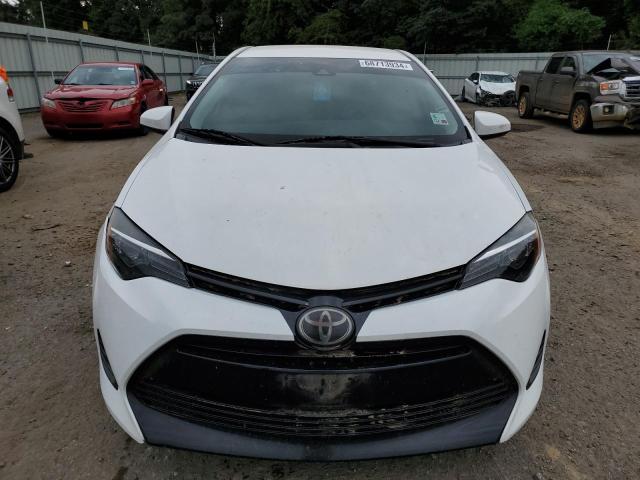 Photo 4 VIN: 5YFBURHE7JP805163 - TOYOTA COROLLA L 