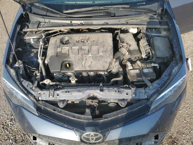 Photo 10 VIN: 5YFBURHE7JP809889 - TOYOTA COROLLA L 